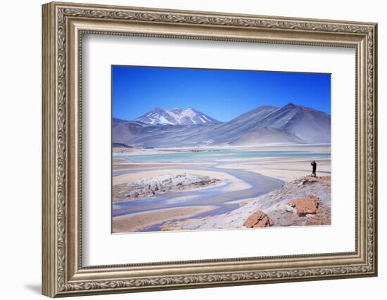 Man Standing on Rocks Looking over Miscanti Laguna, Turquoise Mineral Lake, San Pedro De Atacama-Kimberly Walker-Framed Photographic Print