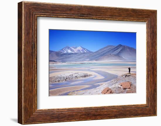 Man Standing on Rocks Looking over Miscanti Laguna, Turquoise Mineral Lake, San Pedro De Atacama-Kimberly Walker-Framed Photographic Print