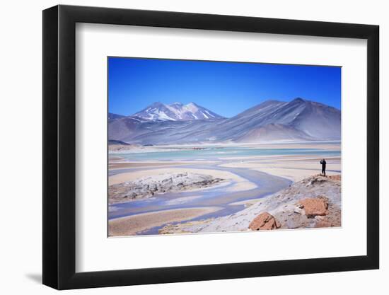 Man Standing on Rocks Looking over Miscanti Laguna, Turquoise Mineral Lake, San Pedro De Atacama-Kimberly Walker-Framed Photographic Print