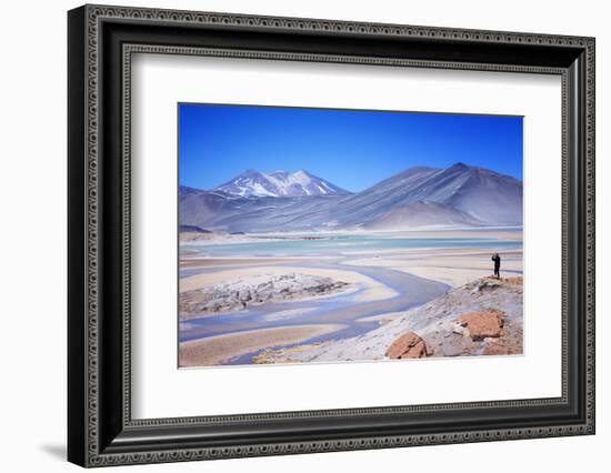 Man Standing on Rocks Looking over Miscanti Laguna, Turquoise Mineral Lake, San Pedro De Atacama-Kimberly Walker-Framed Photographic Print