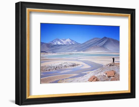 Man Standing on Rocks Looking over Miscanti Laguna, Turquoise Mineral Lake, San Pedro De Atacama-Kimberly Walker-Framed Photographic Print