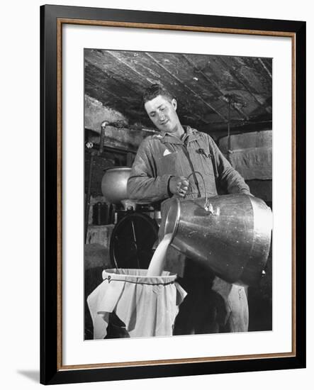 Man Straining Milk into a Can Through a Piece of Cloth-Hansel Mieth-Framed Photographic Print