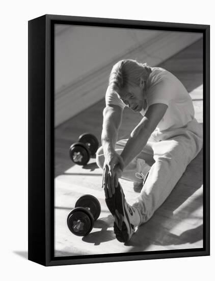 Man Stretching in Gym, New York, New York, USA-Chris Trotman-Framed Premier Image Canvas