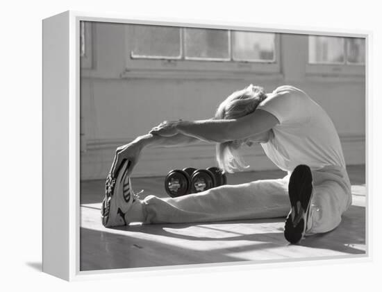 Man Stretching in Gym, New York, New York, USA-Chris Trotman-Framed Premier Image Canvas