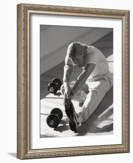 Man Stretching in Gym, New York, New York, USA-Chris Trotman-Framed Photographic Print