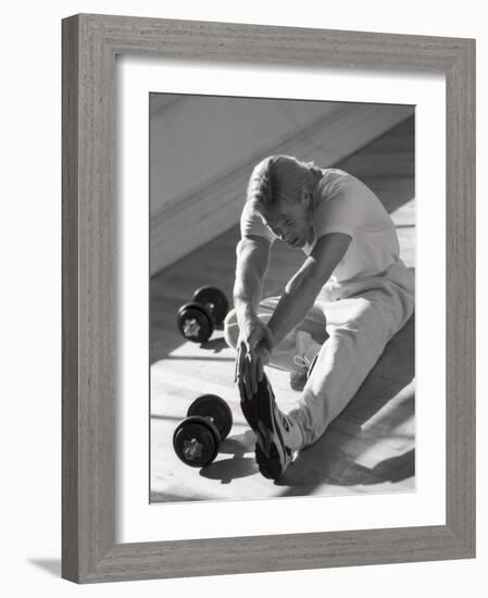 Man Stretching in Gym, New York, New York, USA-Chris Trotman-Framed Photographic Print