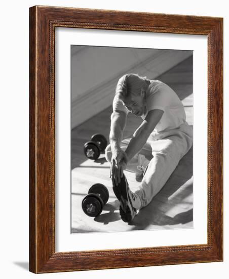 Man Stretching in Gym, New York, New York, USA-Chris Trotman-Framed Photographic Print