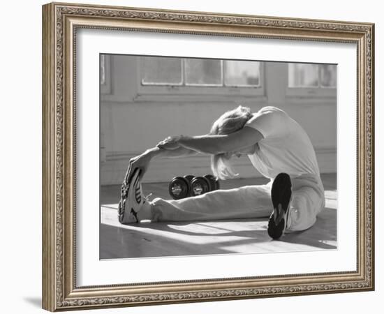 Man Stretching in Gym, New York, New York, USA-Chris Trotman-Framed Photographic Print