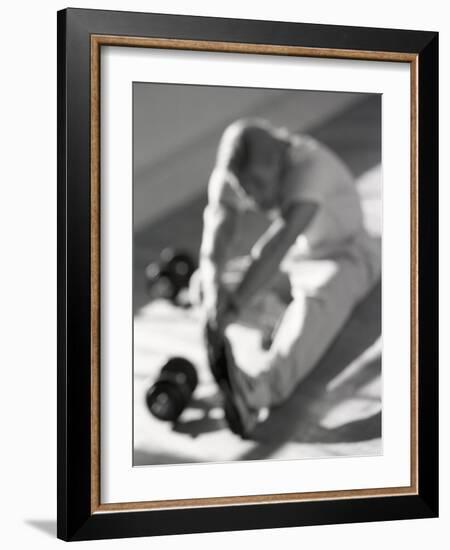 Man Stretching in Gym, New York, New York, USA-Chris Trotman-Framed Photographic Print