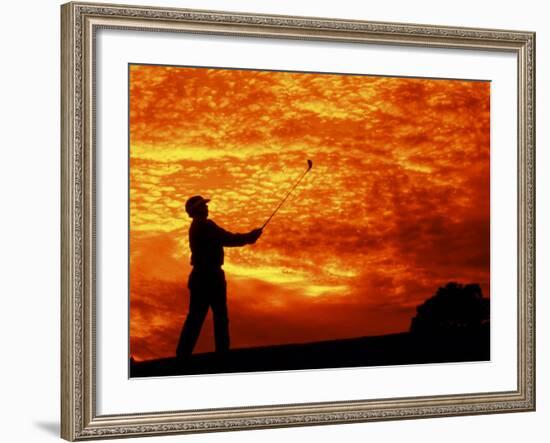 Man Swinging Golf Club at Sunset-Bill Bachmann-Framed Photographic Print