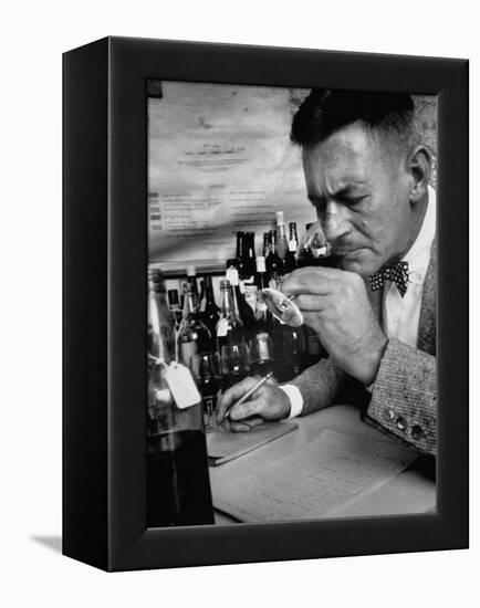 Man Tasting Different Wines-null-Framed Premier Image Canvas