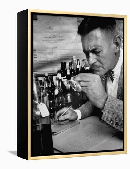 Man Tasting Different Wines-null-Framed Premier Image Canvas