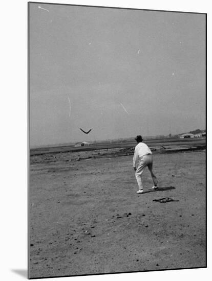 Man Throwing a Boomerang-Carl Mydans-Mounted Premium Photographic Print