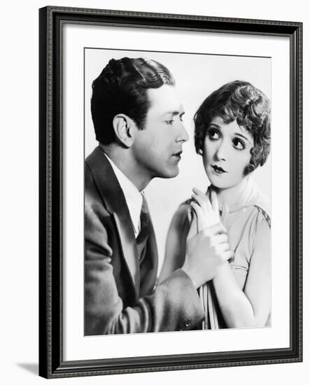 Man Trying to Kiss Uncertain Woman-null-Framed Photo