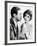 Man Trying to Kiss Uncertain Woman-null-Framed Photo