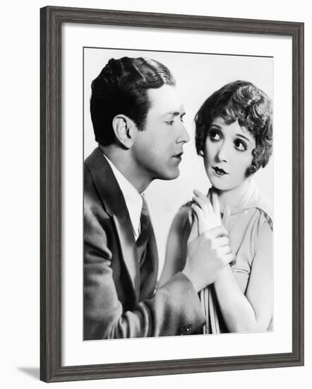 Man Trying to Kiss Uncertain Woman-null-Framed Photo