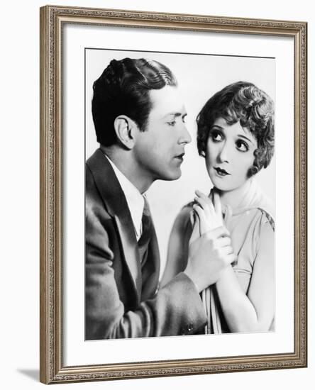 Man Trying to Kiss Uncertain Woman-null-Framed Photo