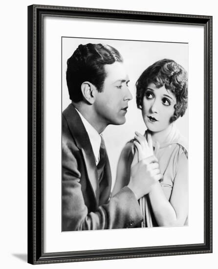 Man Trying to Kiss Uncertain Woman-null-Framed Photo