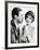 Man Trying to Kiss Uncertain Woman-null-Framed Photo