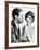 Man Trying to Kiss Uncertain Woman-null-Framed Photo