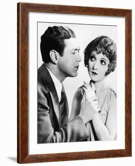 Man Trying to Kiss Uncertain Woman--Framed Photo