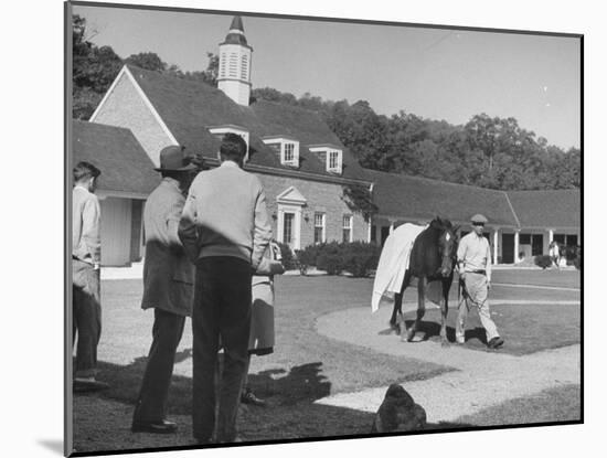 Man Walking Horse in Front of Stables at Rolling Rock Fox Hunt-null-Mounted Photographic Print