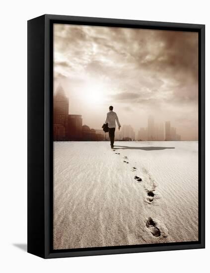 Man Walking in a Desert towards a City-olly2-Framed Premier Image Canvas