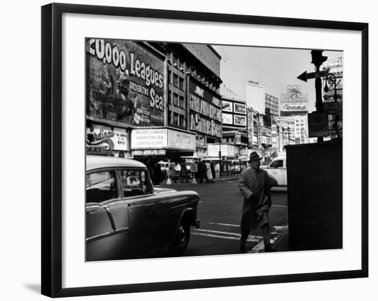 Man Walking Through Time Square-Peter Stackpole-Framed Photographic Print