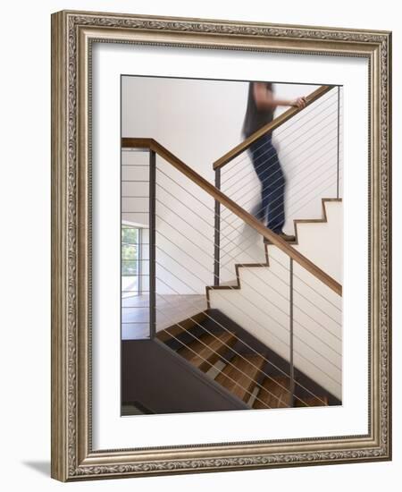 Man Walking Up Stairs in Apartment-John Edward Linden-Framed Photo