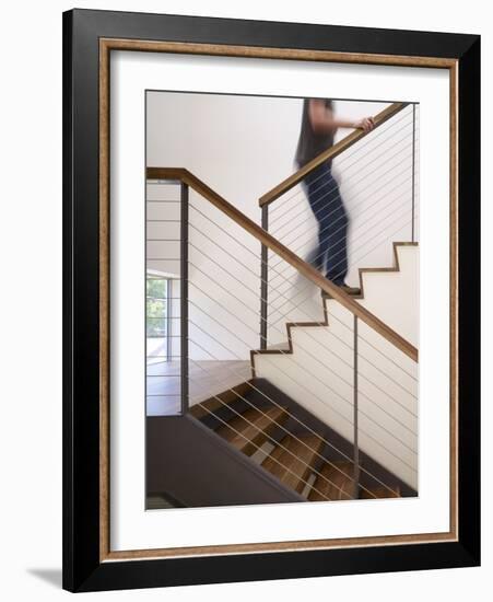 Man Walking Up Stairs in Apartment-John Edward Linden-Framed Photo