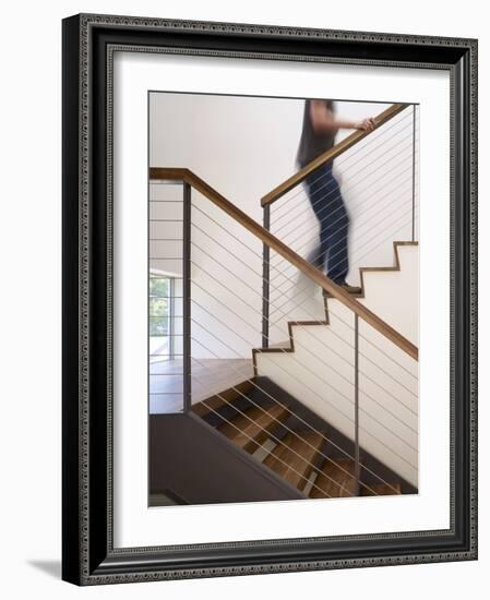 Man Walking Up Stairs in Apartment-John Edward Linden-Framed Photo