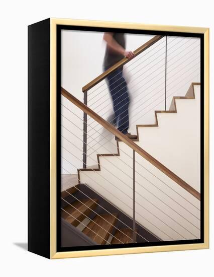 Man Walking Up Stairs in Apartment-John Edward Linden-Framed Stretched Canvas