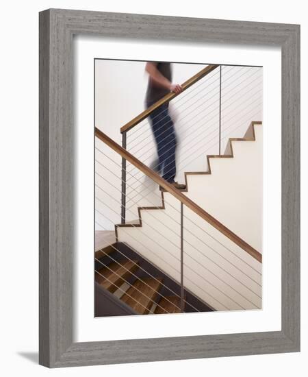 Man Walking Up Stairs in Apartment-John Edward Linden-Framed Photo