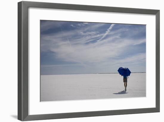 Man Walking With Blue Umbrella On The Bonneville Salt Flats-Lindsay Daniels-Framed Photographic Print
