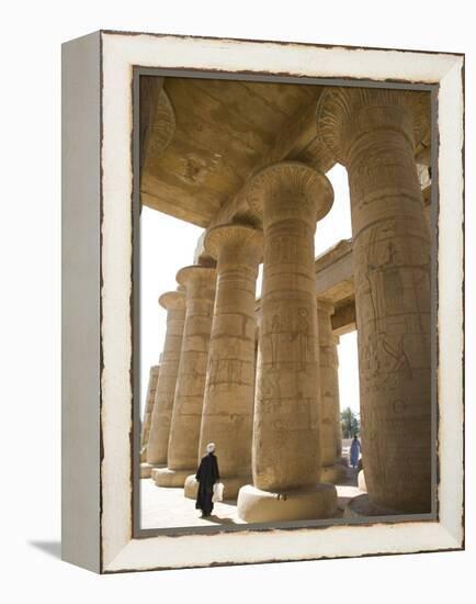 Man Walks Underneath the Giant Columns of the Hypostyle Hall in the Ramesseum, Luxor-Julian Love-Framed Premier Image Canvas