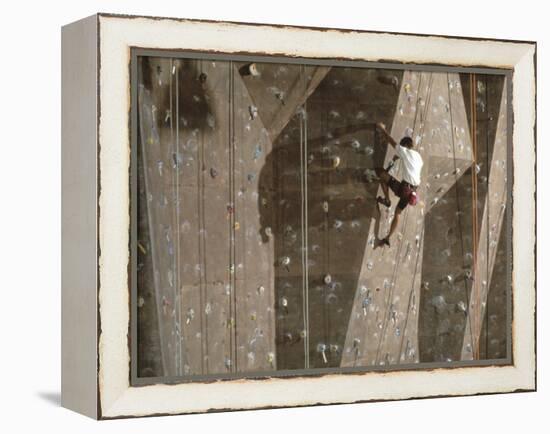 Man Wall Climbing Indoors with Equipment-null-Framed Premier Image Canvas