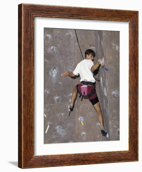 Man Wall Climbing Indoors with Equipment-null-Framed Photographic Print