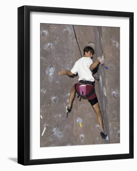 Man Wall Climbing Indoors with Equipment-null-Framed Photographic Print