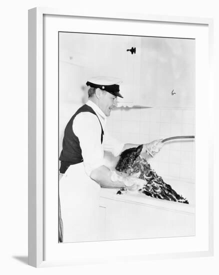 Man Washing His Dog in a Tub-null-Framed Photo