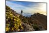 Man watching the mist at sunrise standing on rocks on Pico de la Zarza mountain peak, Fuerteventura-Roberto Moiola-Mounted Photographic Print