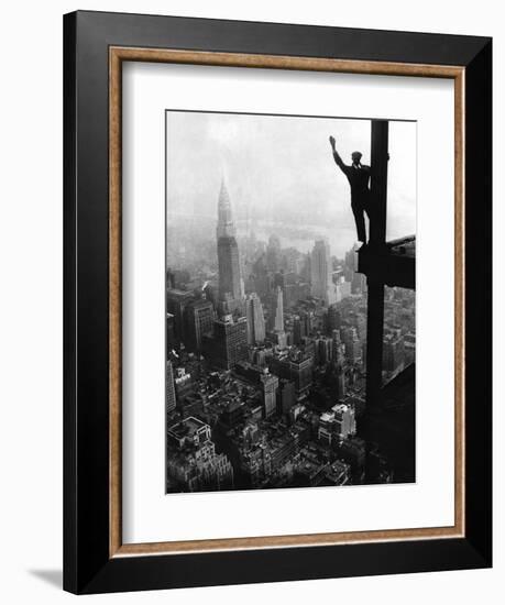 Man Waving from Empire State Building Construction Site--Framed Photographic Print
