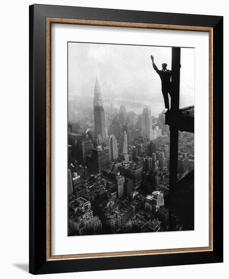 Man Waving from Empire State Building Construction Site-null-Framed Photographic Print