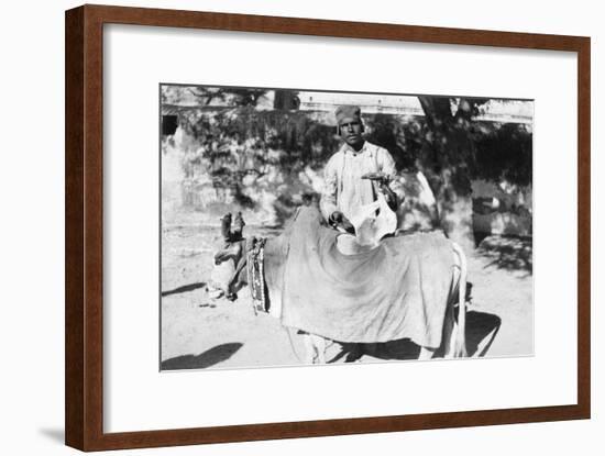 Man with a Deformed Cow, India, 1916-1917-null-Framed Giclee Print
