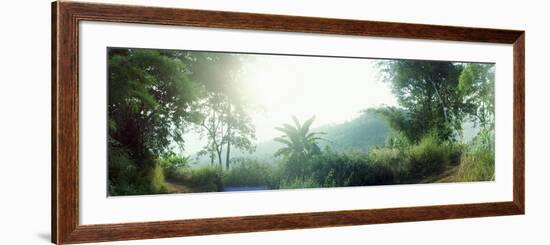 Man with a Slingshot in a Forest, Chiang Mai, Thailand-null-Framed Photographic Print