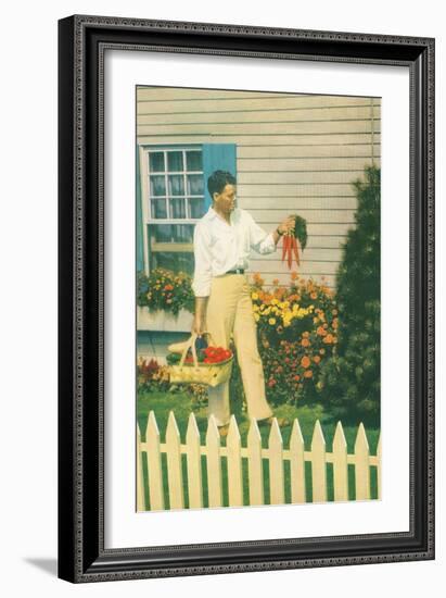 Man with Carrots in Yard-null-Framed Art Print