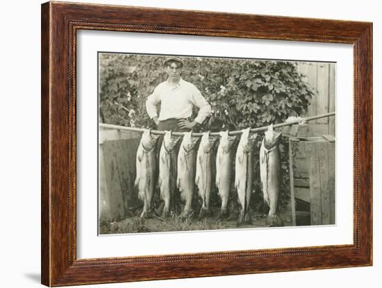 Man with Fish Hanging on Pole-null-Framed Art Print