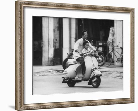 Man with His Son on Scooter-John Dominis-Framed Photographic Print