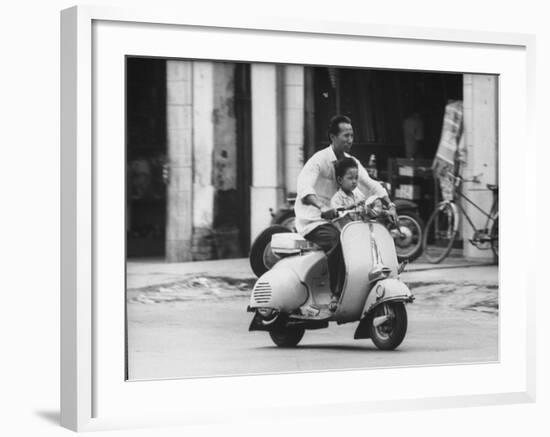 Man with His Son on Scooter-John Dominis-Framed Photographic Print