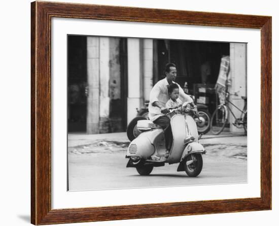 Man with His Son on Scooter-John Dominis-Framed Photographic Print