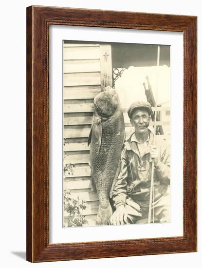 Man with Large Grouper-null-Framed Art Print